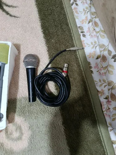 Vim do microfone limpar longa distância sem fio e um profissional com fio todos os três