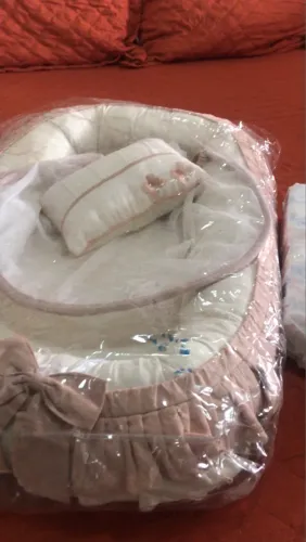Ninho para bebê de linho.