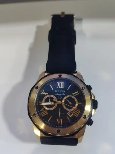 Relógio bulova marine Star dourado