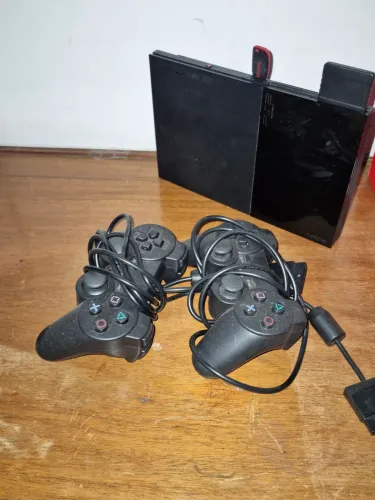 ps2 com dois controles e jogos no pendrive 