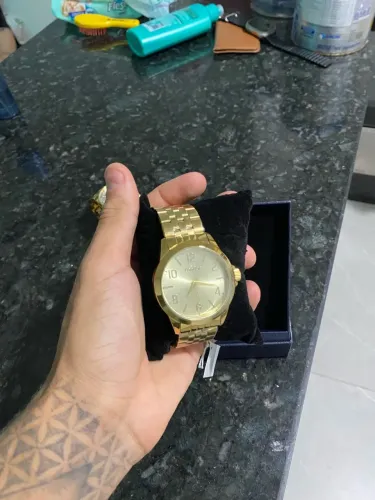 Relógio condor dourado