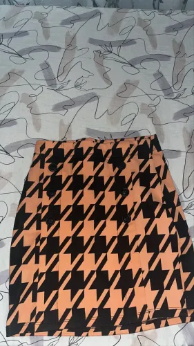 Saia bluesteel renner preta e laranja estampada tam. P