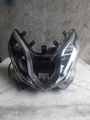 Farol da Honda elite 