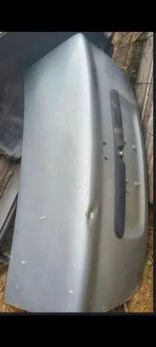 tampa porta mala corsa sedan