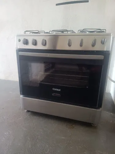 Fogão usado acendendo manual