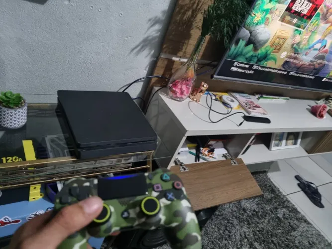 Ps4 slim, 1 TB semi novo.