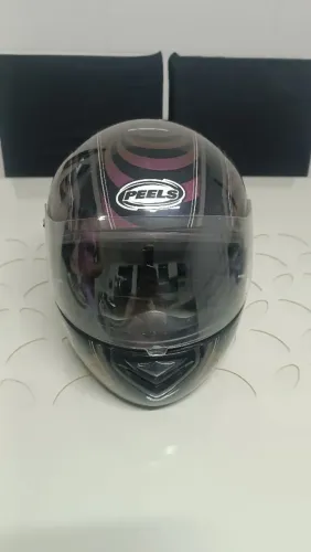 Capacete Pells Tam 60 , estado de novo , pouquíssimo uso . 