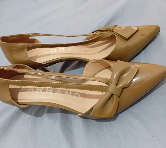 Sapato usado bem conservado