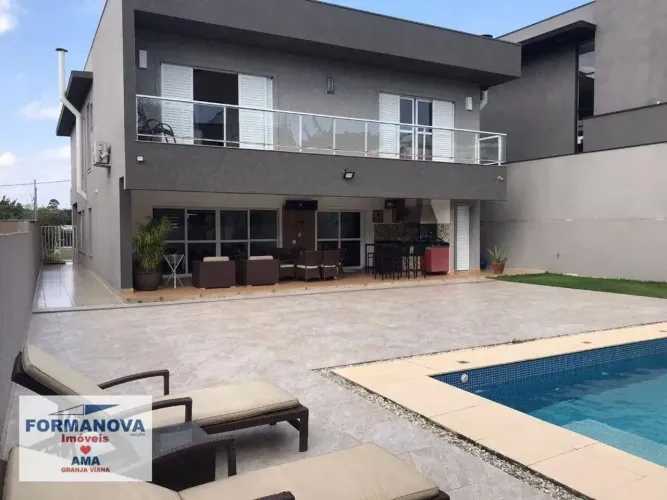 Casa com 5 suítes, piscina, área gourmet à venda ou para locação na Granja Viana - Jandira