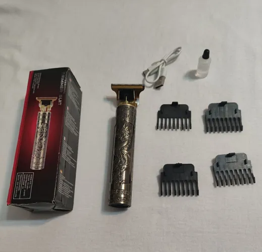 Máquina de barbear/ cortar cabelo - recarregável USB- nova na caixa