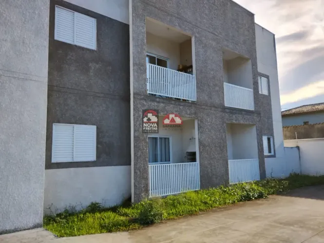Apartamento em condomínio fechado em Caraguatatuba com varanda gourmet