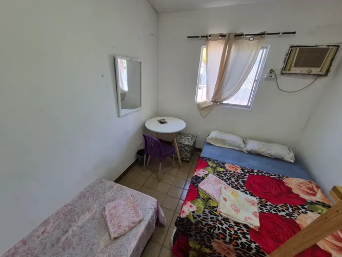 Quarto com wc compartilhado