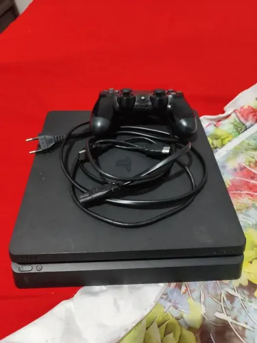 PS4 Slim com 4 jogos, troco por Xbox Series S"