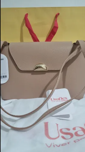 Vendo bolsa belíssima 100% couro Usaflex cor nude versátil moderna perfeita dia e noite
