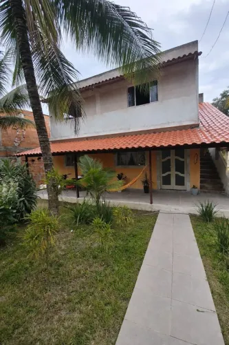 Duas casas + kitinete em lote grande em Piúma ES 
