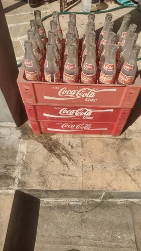 Engradado com garrafas antigos coca cola