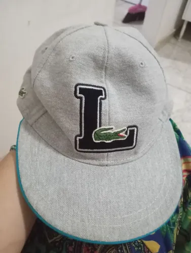 Boné Lacoste sport  em perfeito  estado.
