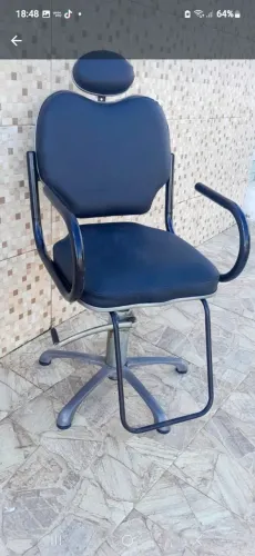 Cadeira de barbeiro bem conservada