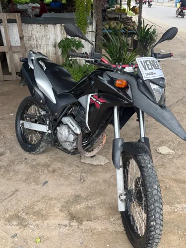 XRE 300 PRA VENDER LOGO