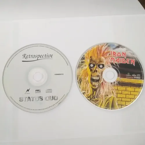 DOIS CDS STATUS QUO E IRON MAIDEN