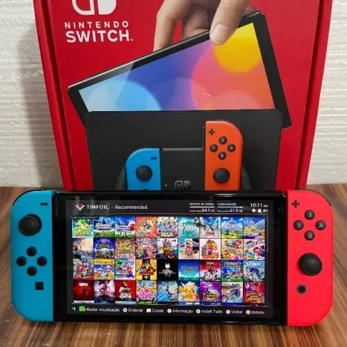 Nintendo Switch Oled 64GB + 128GB Azul e Vermelho Lotado de Jogos