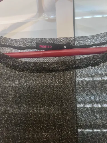Blusa transparente brilhosa