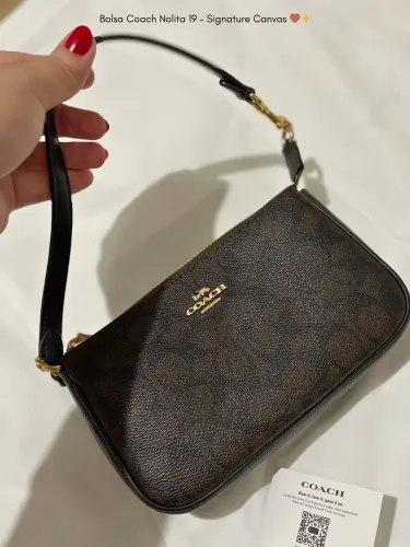 Coach Nolita 19 em Signature Canvas