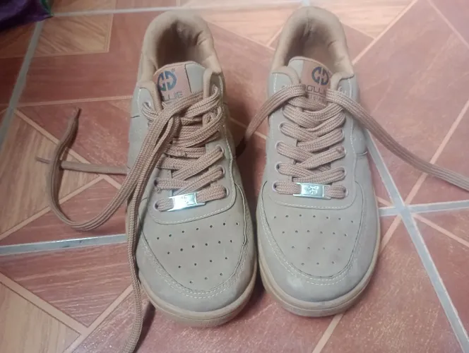 Sapatos Ollie Kings em ótimos estados