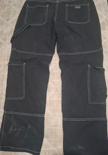 Calça jeans pano super grosso preta com costuras brancas