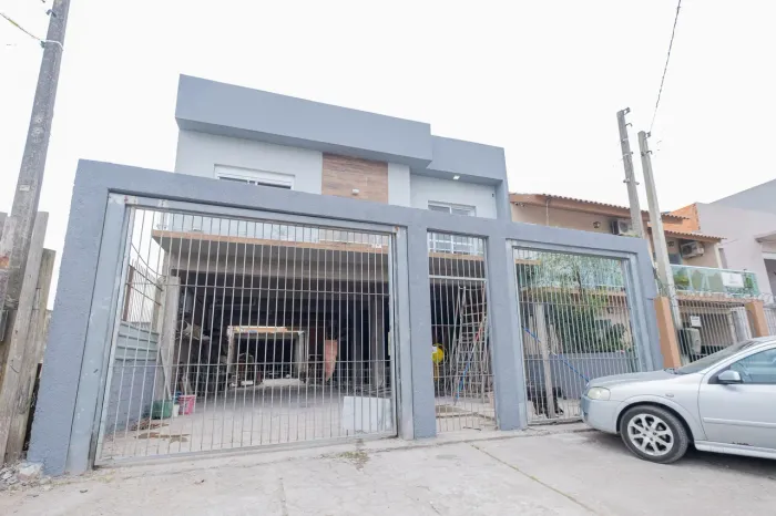Casa com energia fotovoltaica, suíte, lareira, área gourmet, jardim de inverno, sacada e a