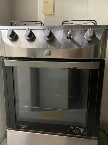 Fogão 4 bocas funcionando forno