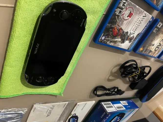 Psvita oled perfeito,bloqueado com 6 jogos (Envio)