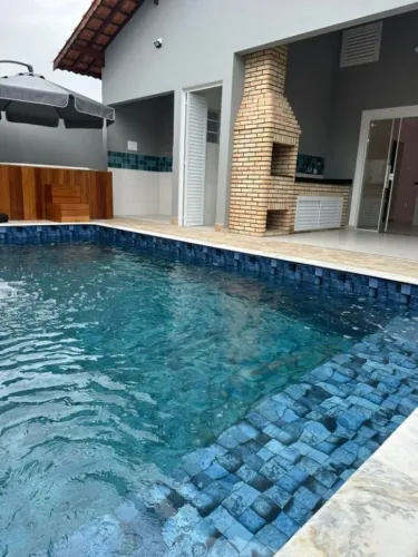 Casa com 3 dormitórios à venda, 108 m² por R$ 699.000,00 - Itaguaí - Mongaguá/SP