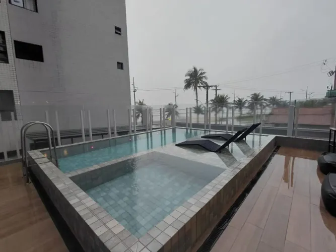 Apartamento com 1 dormitório à venda, 50 m² por R$ 426.000,00 - Caiçara - Praia Grande/SP