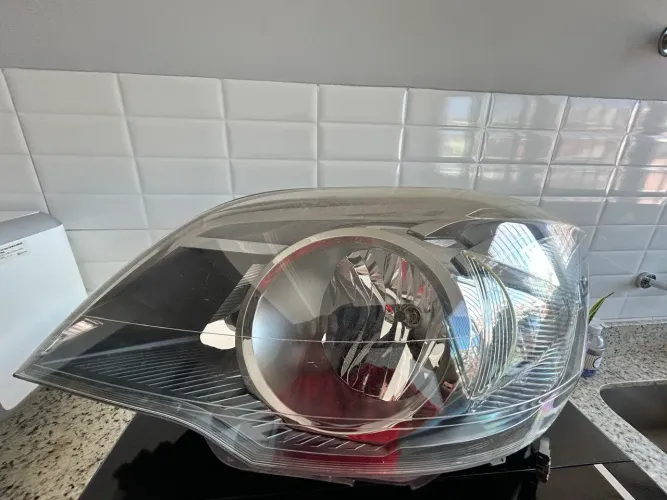 Farol lado esquerdo original Montana 2013 ls 1.4
