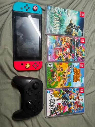 Nintendo Switch v2 + 4 Jogos + Pro Controller + Case + Dock + Cartão de memória 256gb
