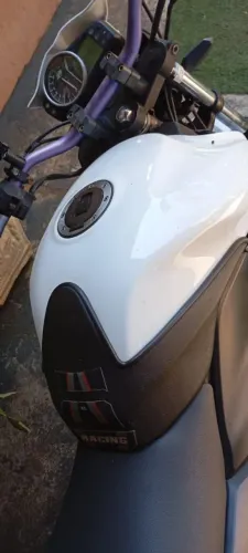 next 250 com acessórios 
