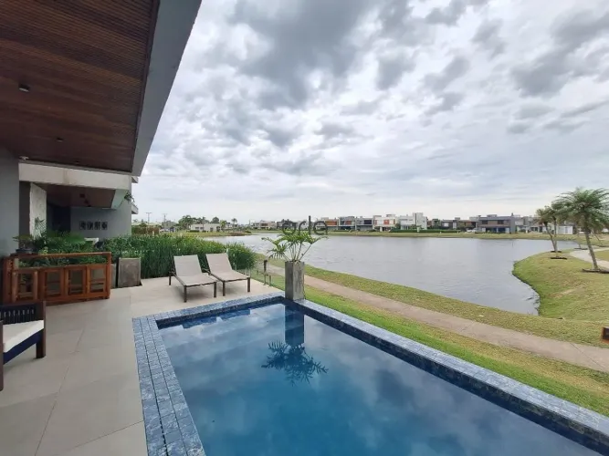 Casa beira lago mobiliada com piscina e 04 suítes à venda - Condomínio Blue Xangri-Lá REF: