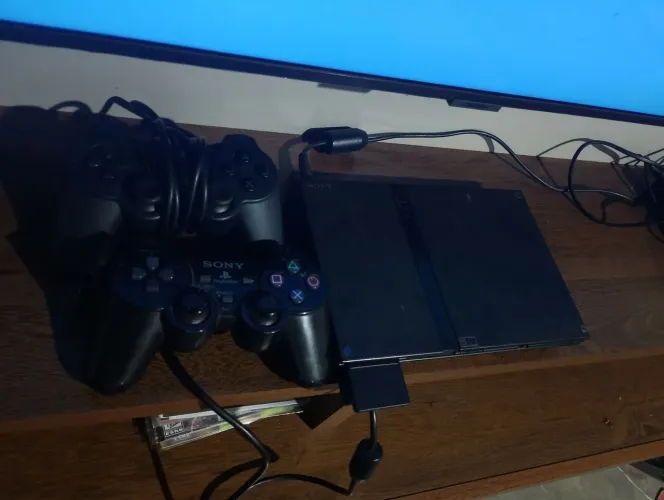 Play2 com adaptador para smartv 