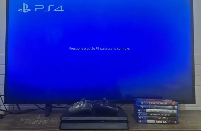 Ps4 slim 1TB 2 controles e 9 jogos