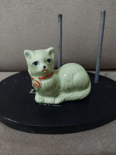 Gato antigo de porcelana