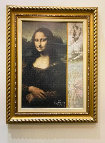 Quadro Quebra-Cabeças Montado 1000 peças Mona Lisa, O Código Da Vinci (Moldura e Vidro)