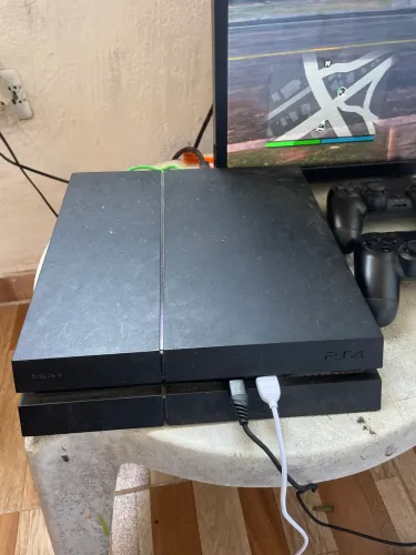 Vendo ps4 fat pouco usado fasso até 1400