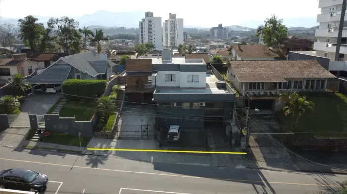 Terreno com casa de alvenaria e galpão comercial Costa e Silva Joinville.