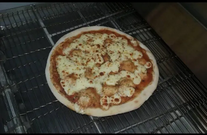 Produção de massa de pizza 