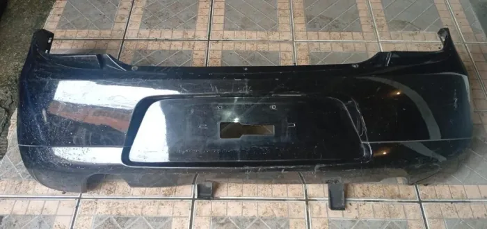 PARACHOQUE TRASEIRO CHEVROLET AGILE 10/14 COM DETALHE 