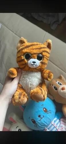 Tigre olhos brilhantes pelúcia 