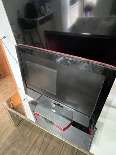 Vendo tv e suporte articulado