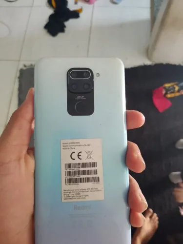 Vendo essa geladeira e esse celular