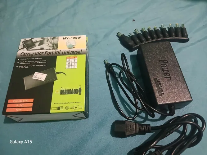Vendo carregador universal para notebook. 